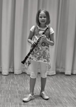 Kind mit Oboe